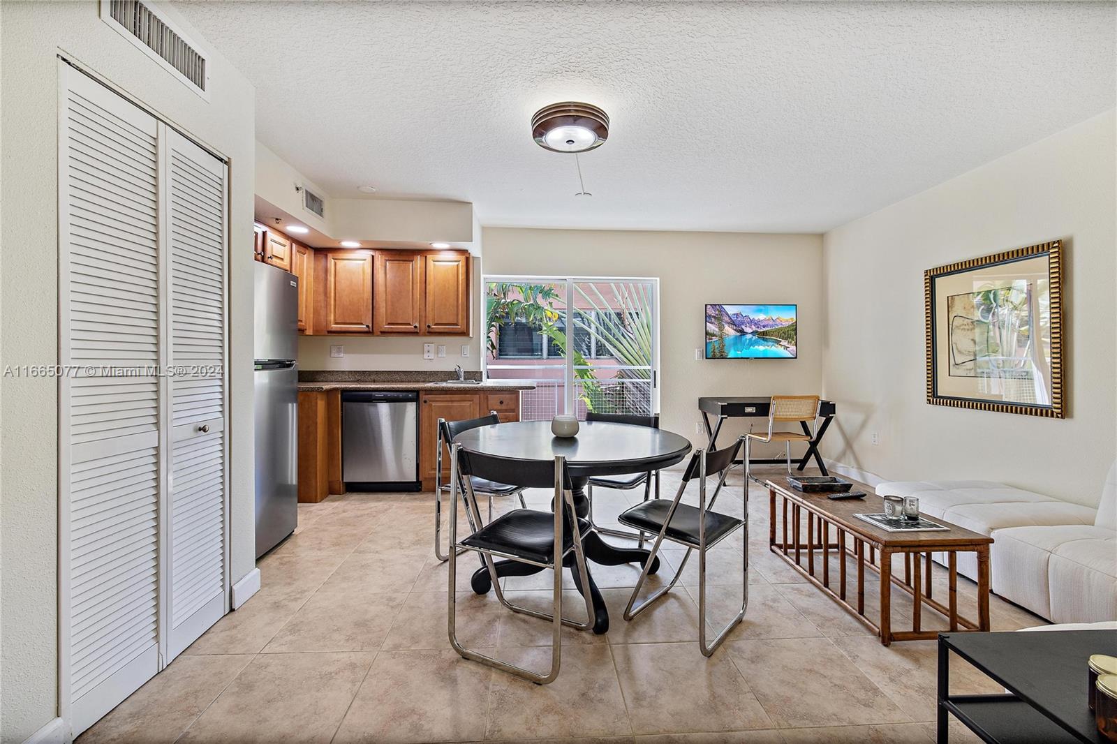 a view of a dining room with furniture