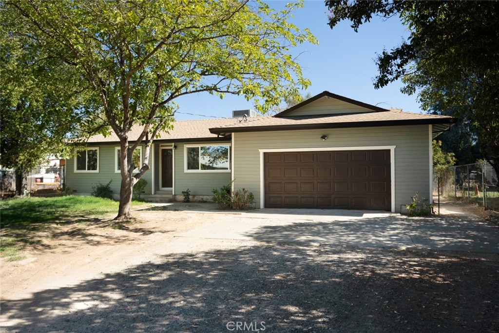 a house with yard in front of it