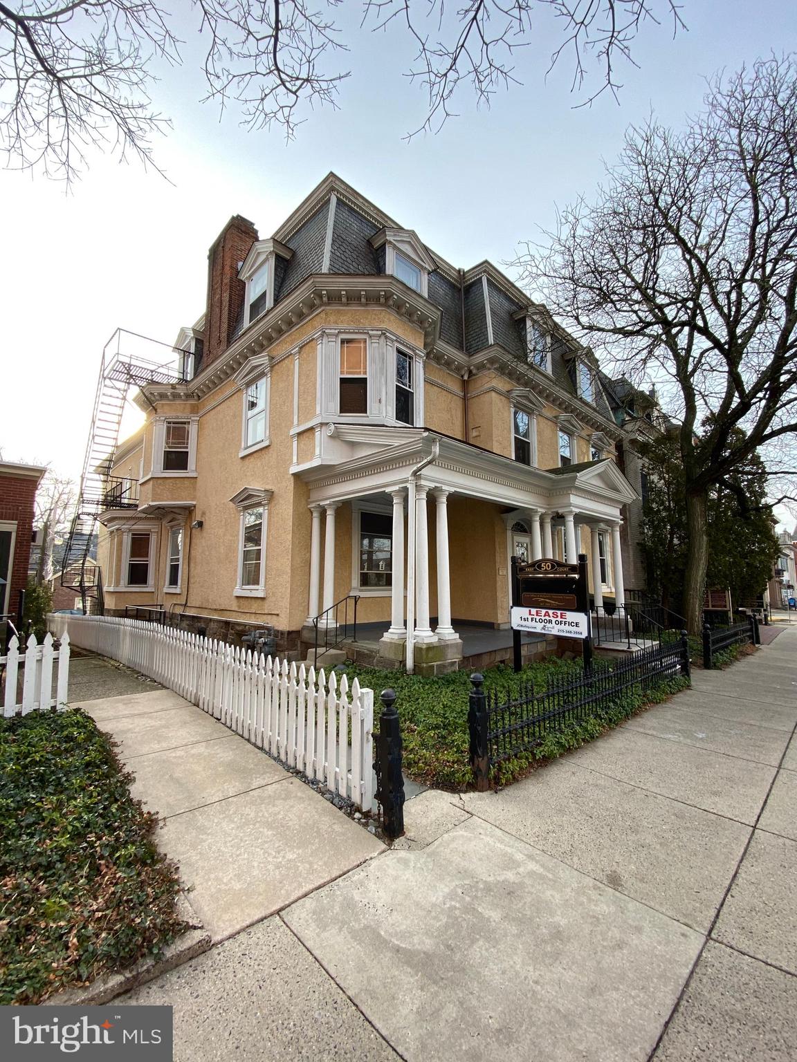 a front view of a house with yard