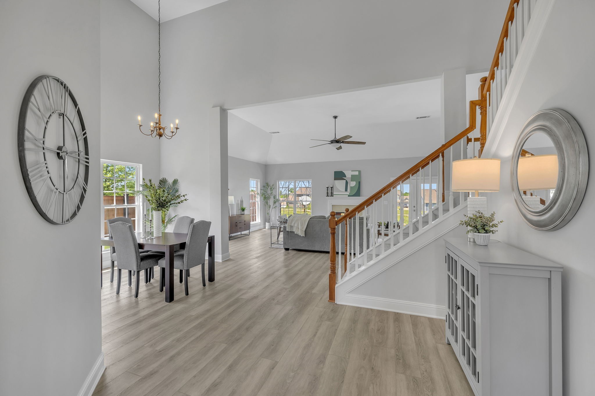 a view of entryway livingroom and hall with wooden floor