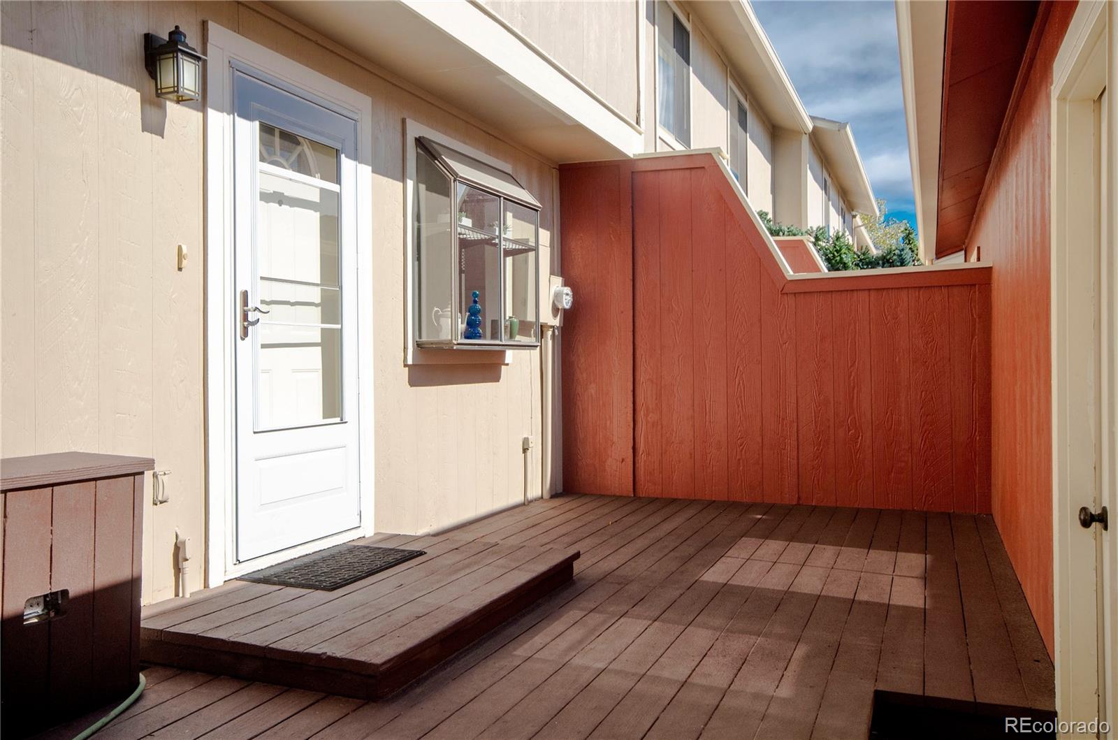 a view of a wooden floor with a window