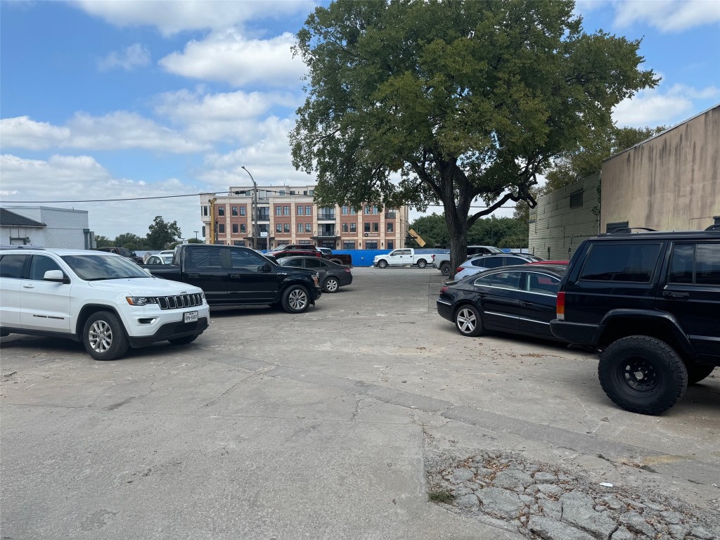 a view of a car parked in front of a house