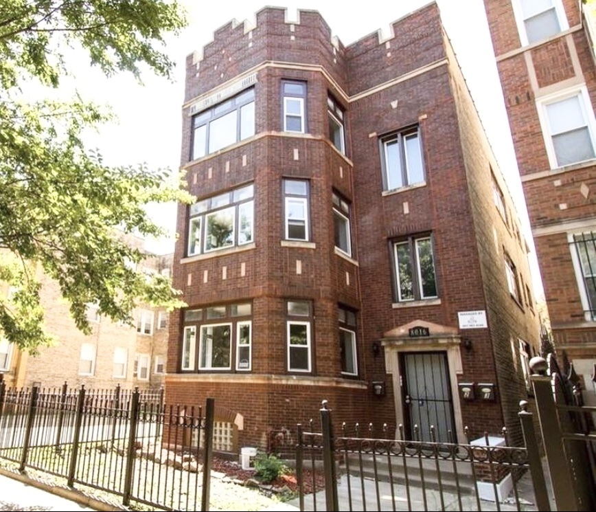 a front view of a multi story residential apartment building