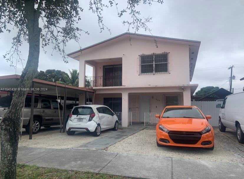 a car parked in front of a house