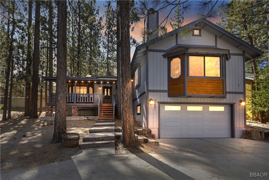 a front view of a house with a garage