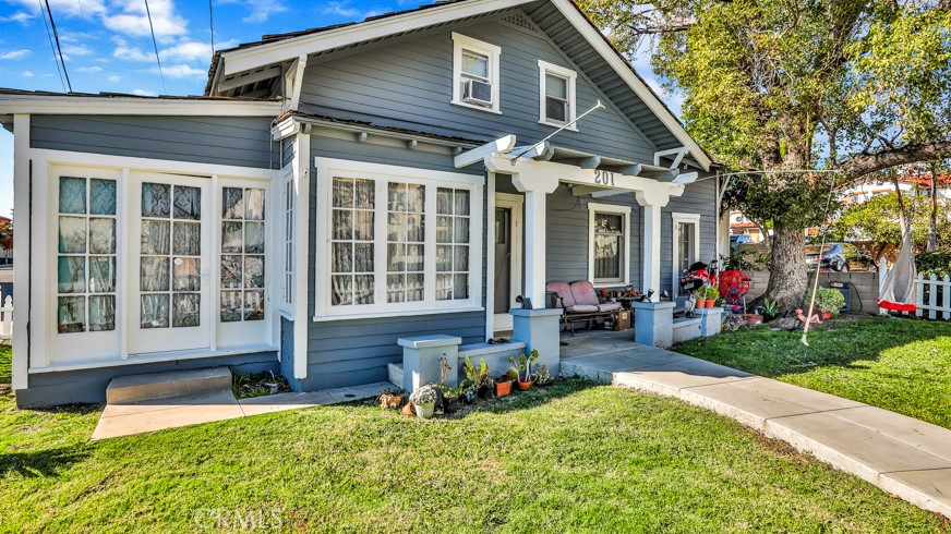 a front view of a house with patio