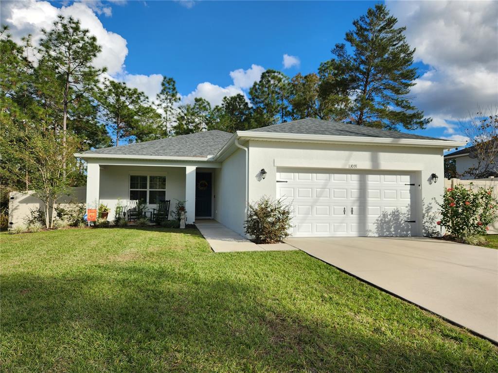 front view of a house with a yard