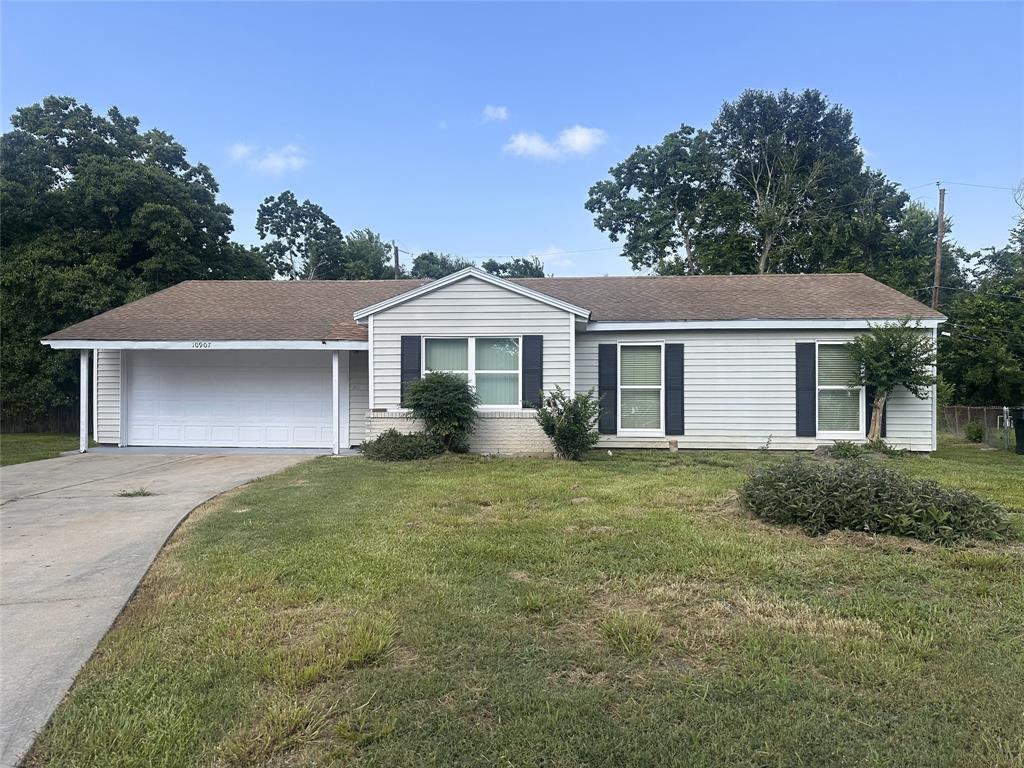 front view of a house and a yard