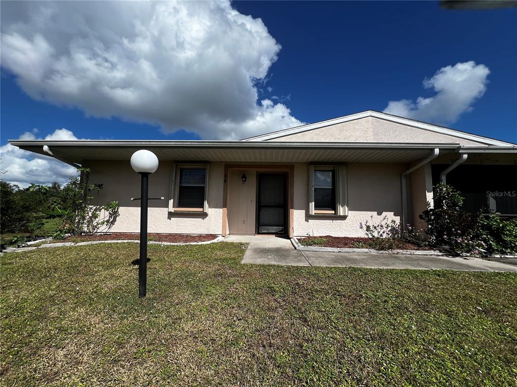 a front view of house with yard