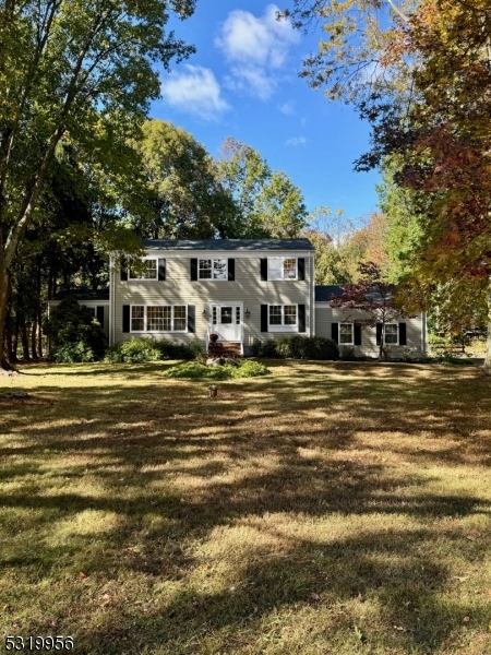 a front view of a house with a ocean view