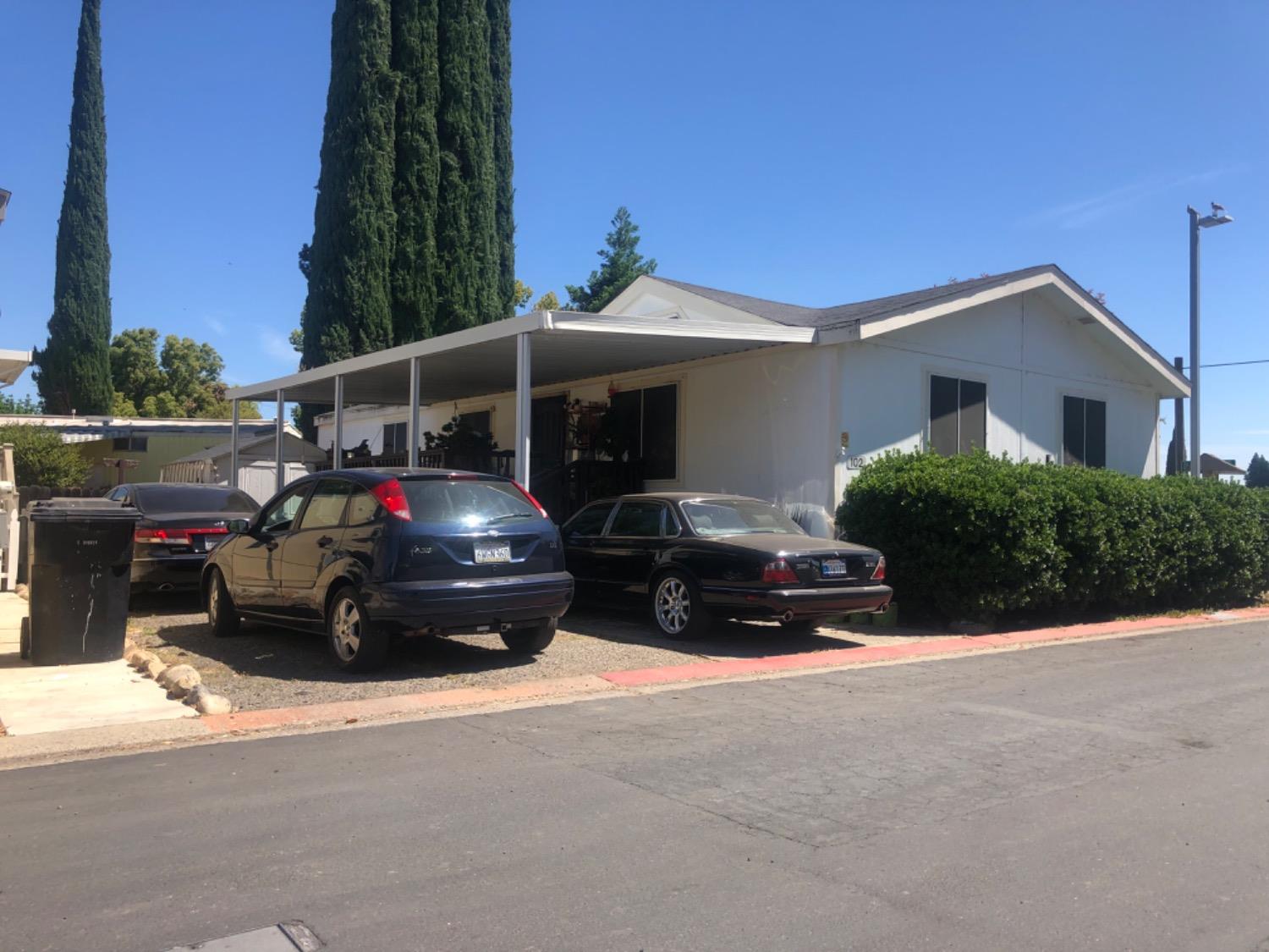 a car parked in front of a house