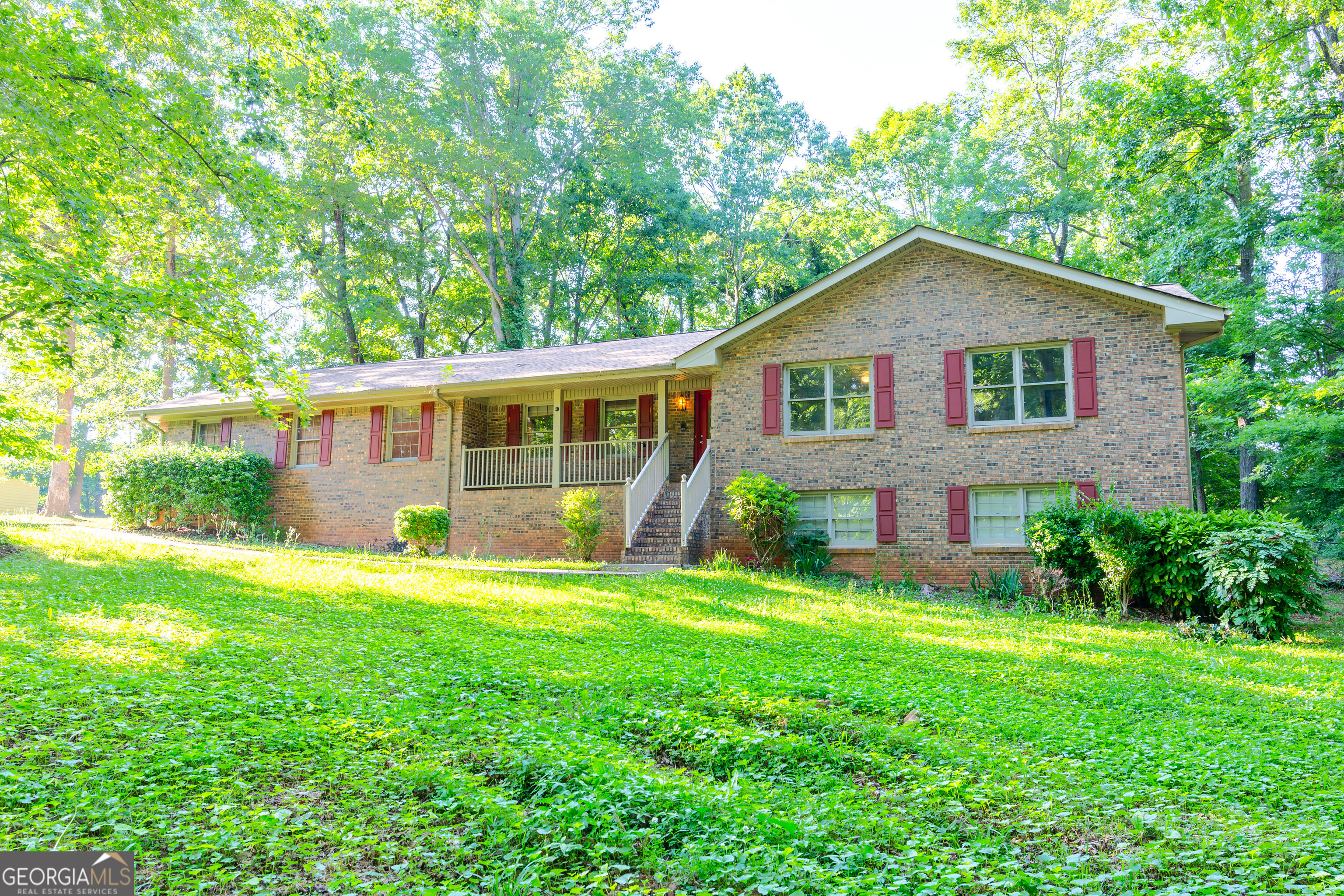 front view of a house with a yard