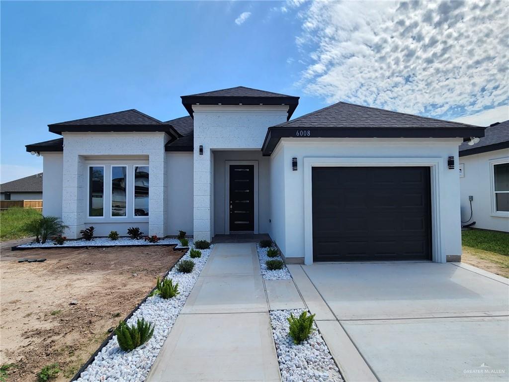 View of front facade with a garage