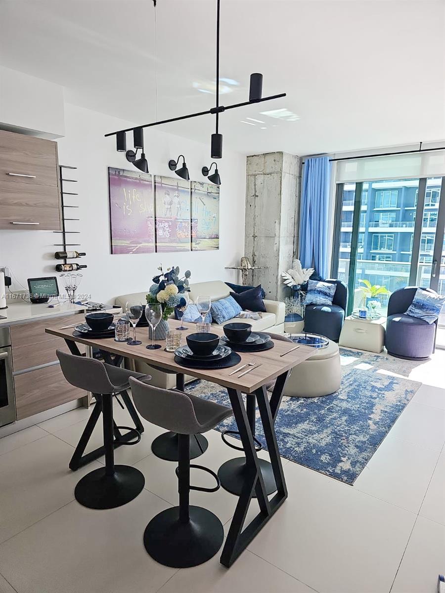 a view of a dining room with furniture