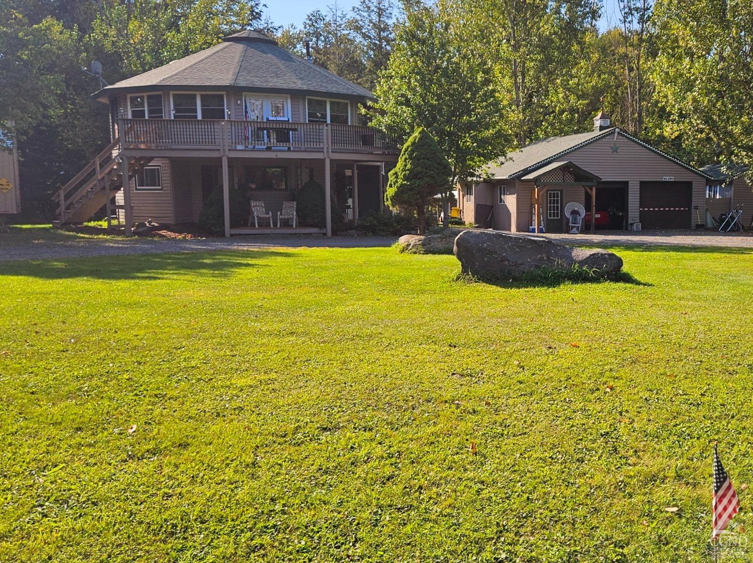 a view of a house with a swimming pool