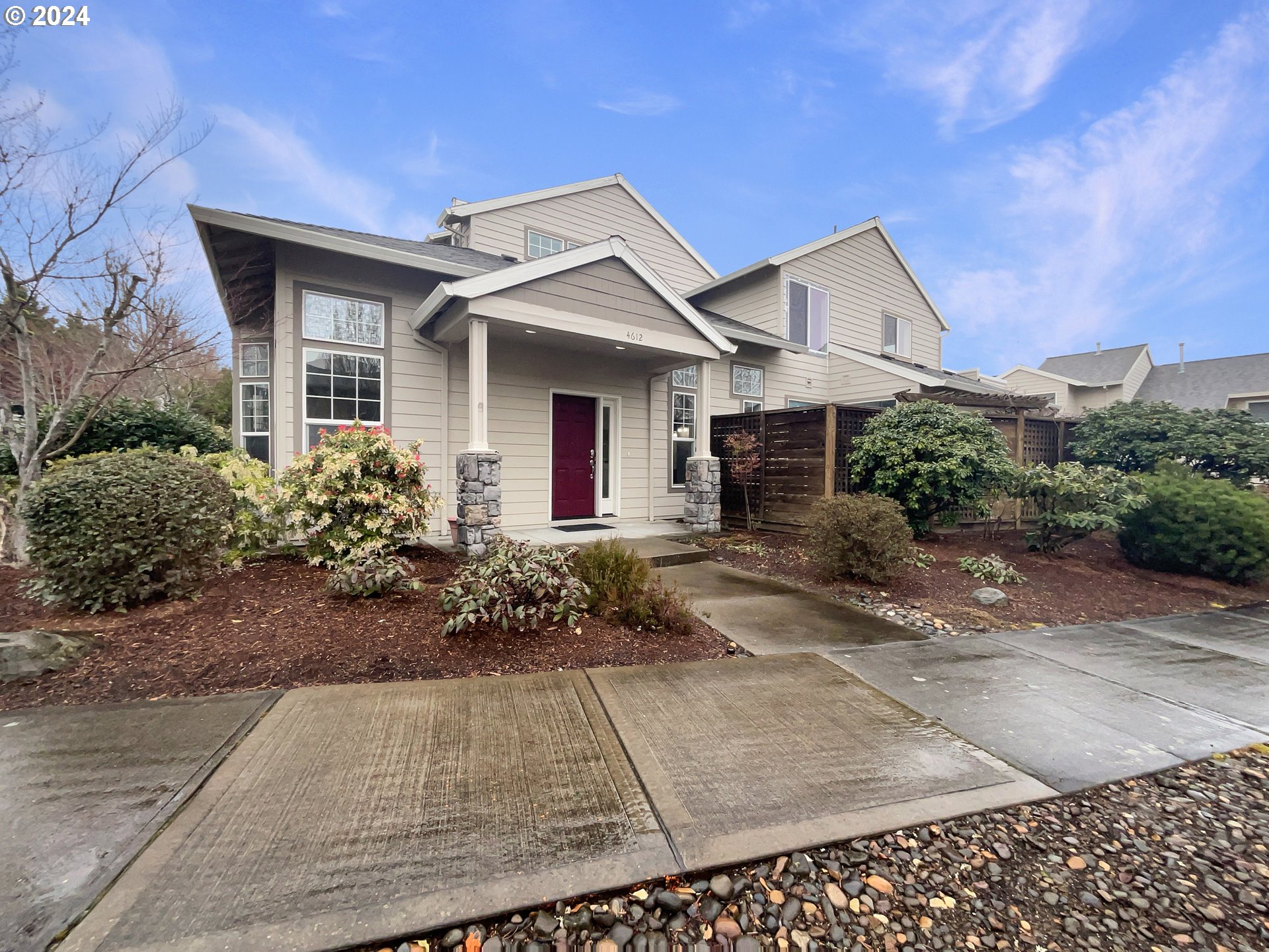 front view of a house with a yard