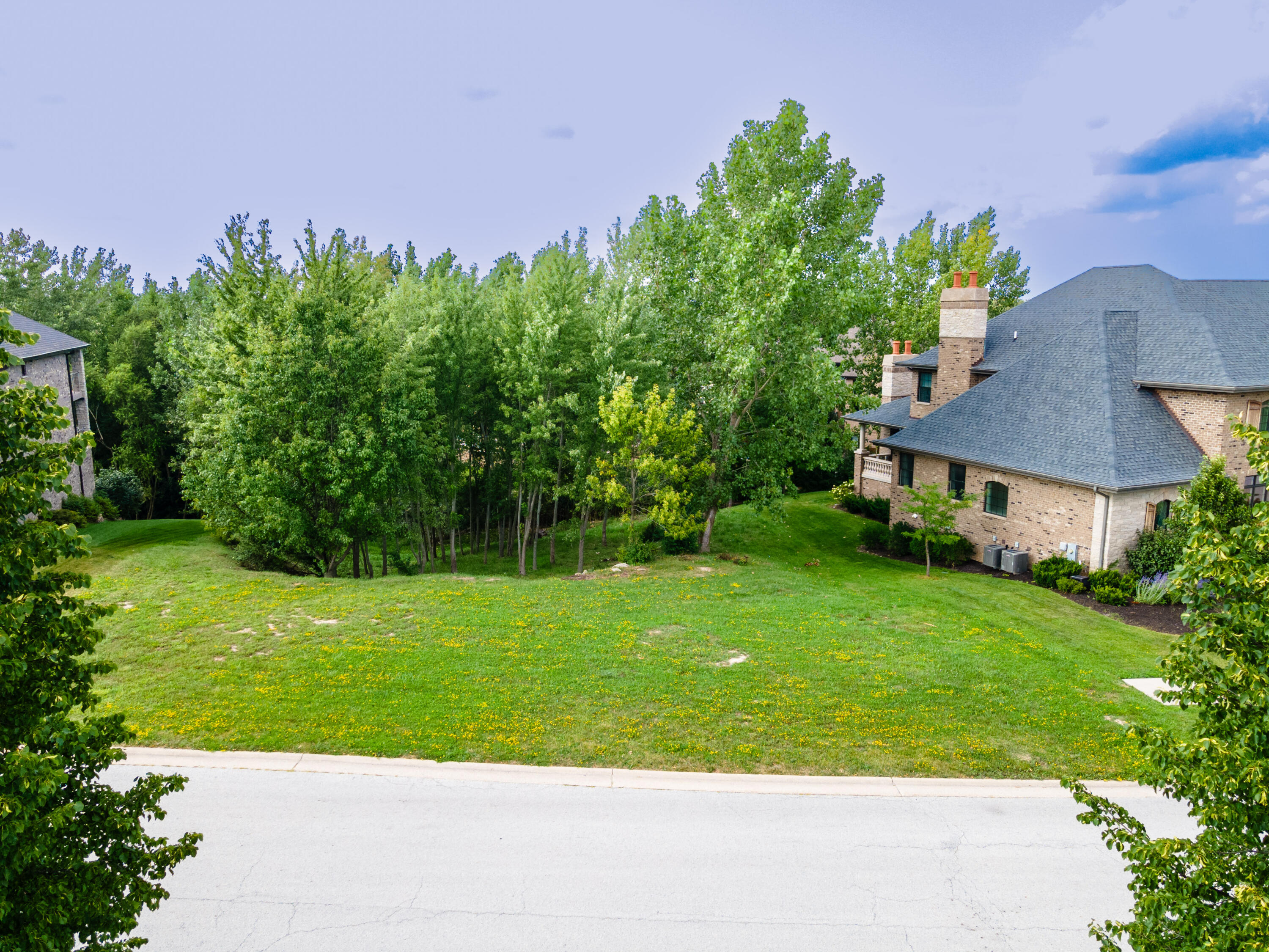 a view of a house with a big yard