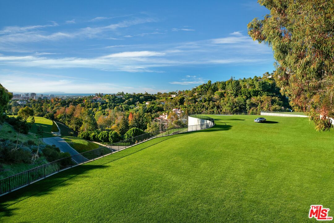 a view of a golf course with a garden