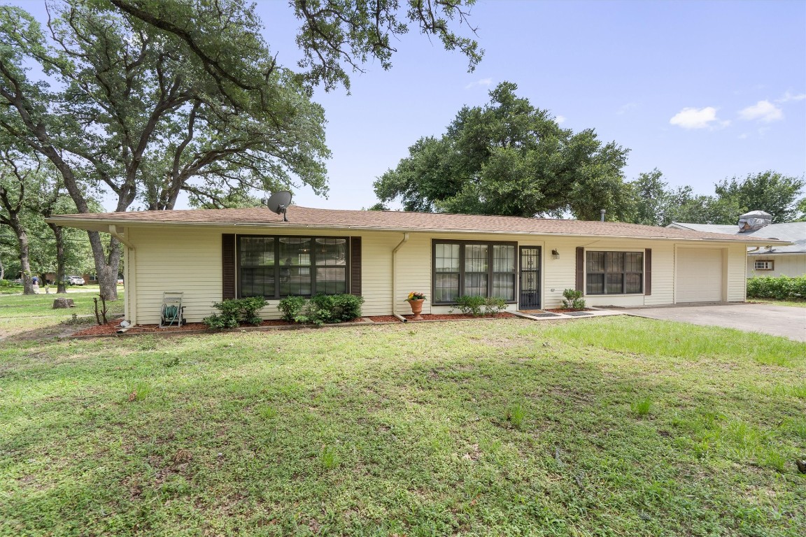 front view of a house with a patio