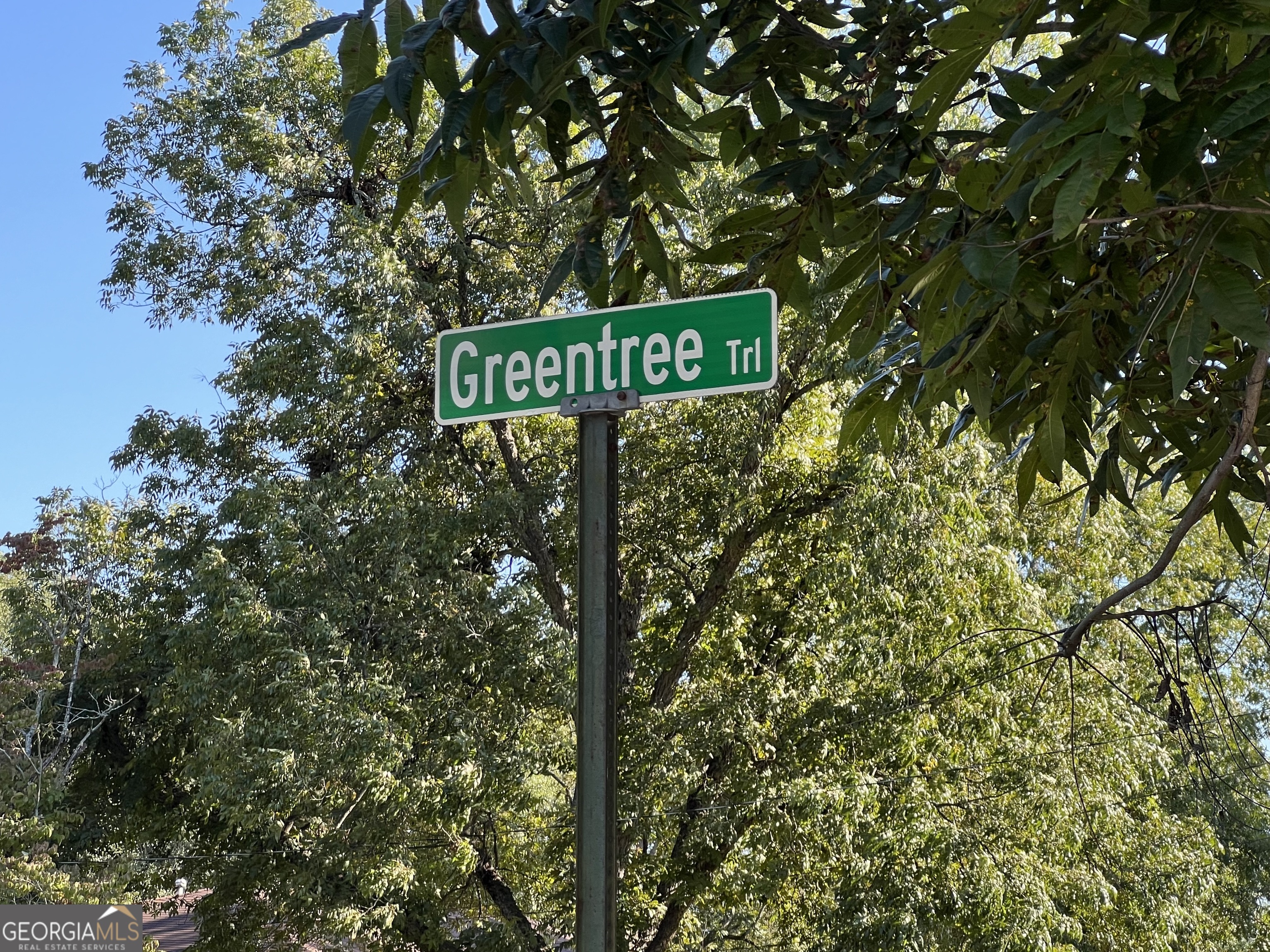 a street sign that is sitting on a pole