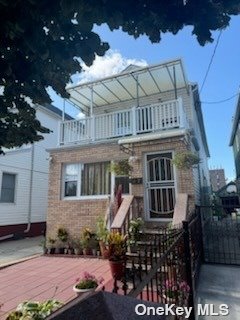 a front view of a house with balcony