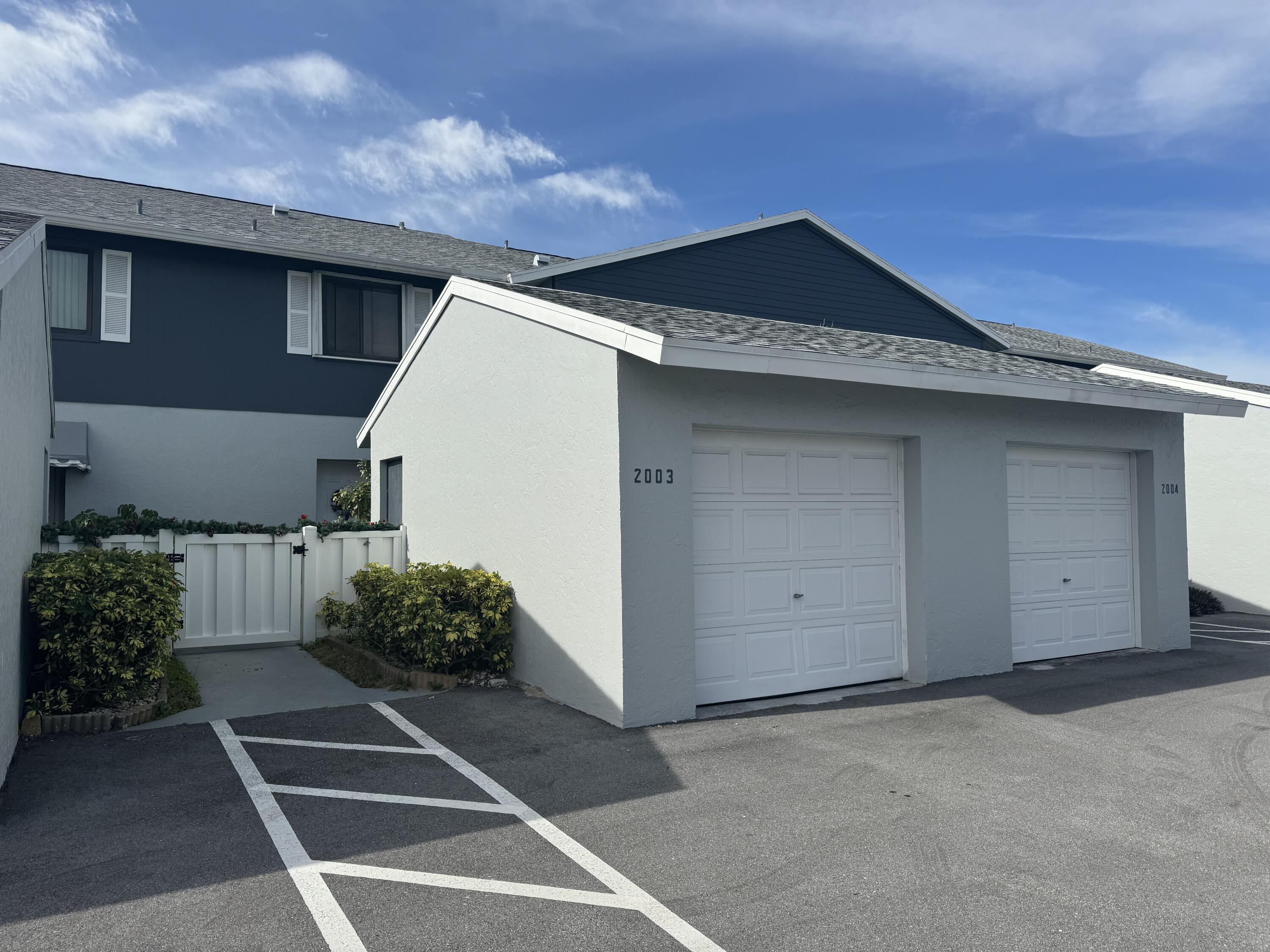 a view of a garage of the house