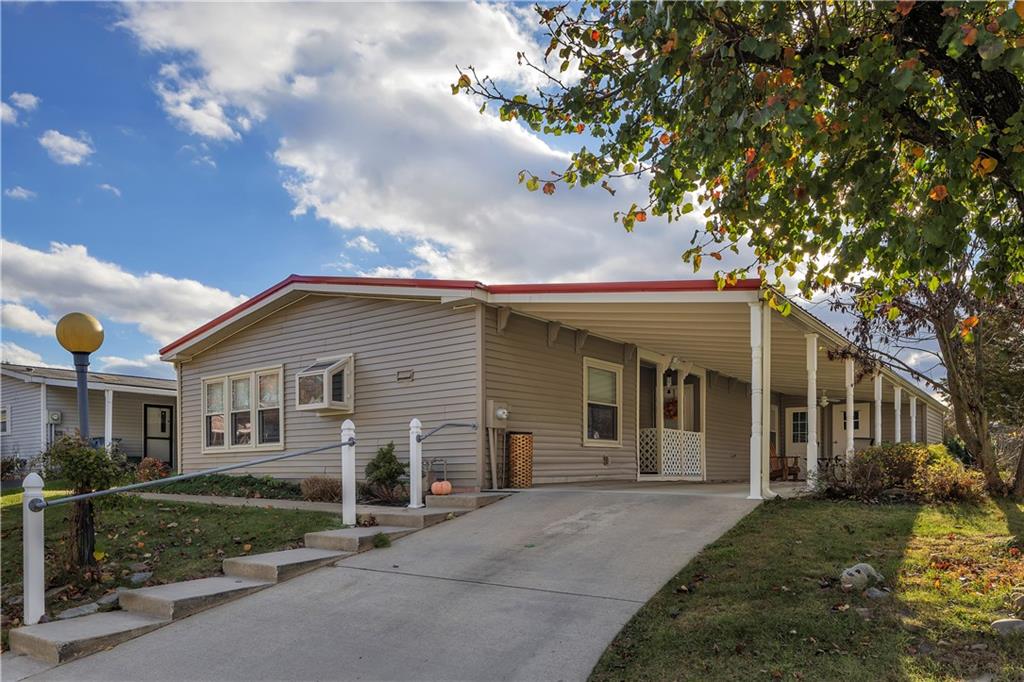 front view of house with a yard