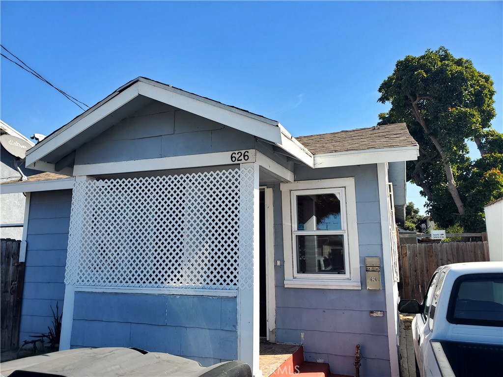 a front view of a house with garage