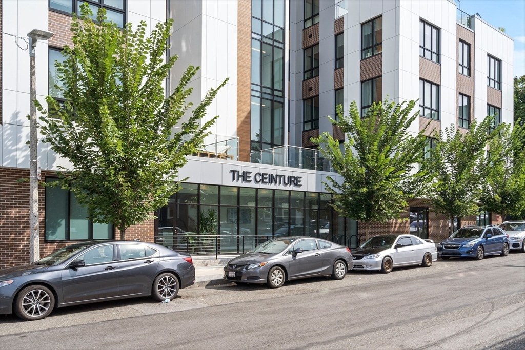 a car parked in front of a building