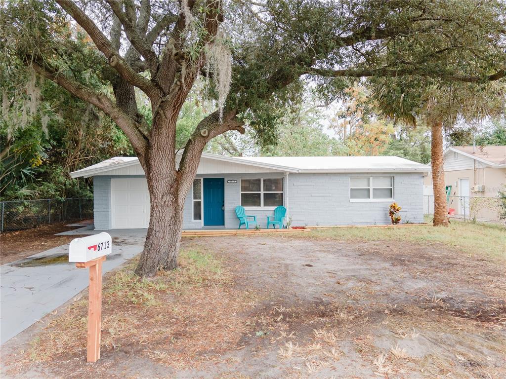 a house with trees in front of it