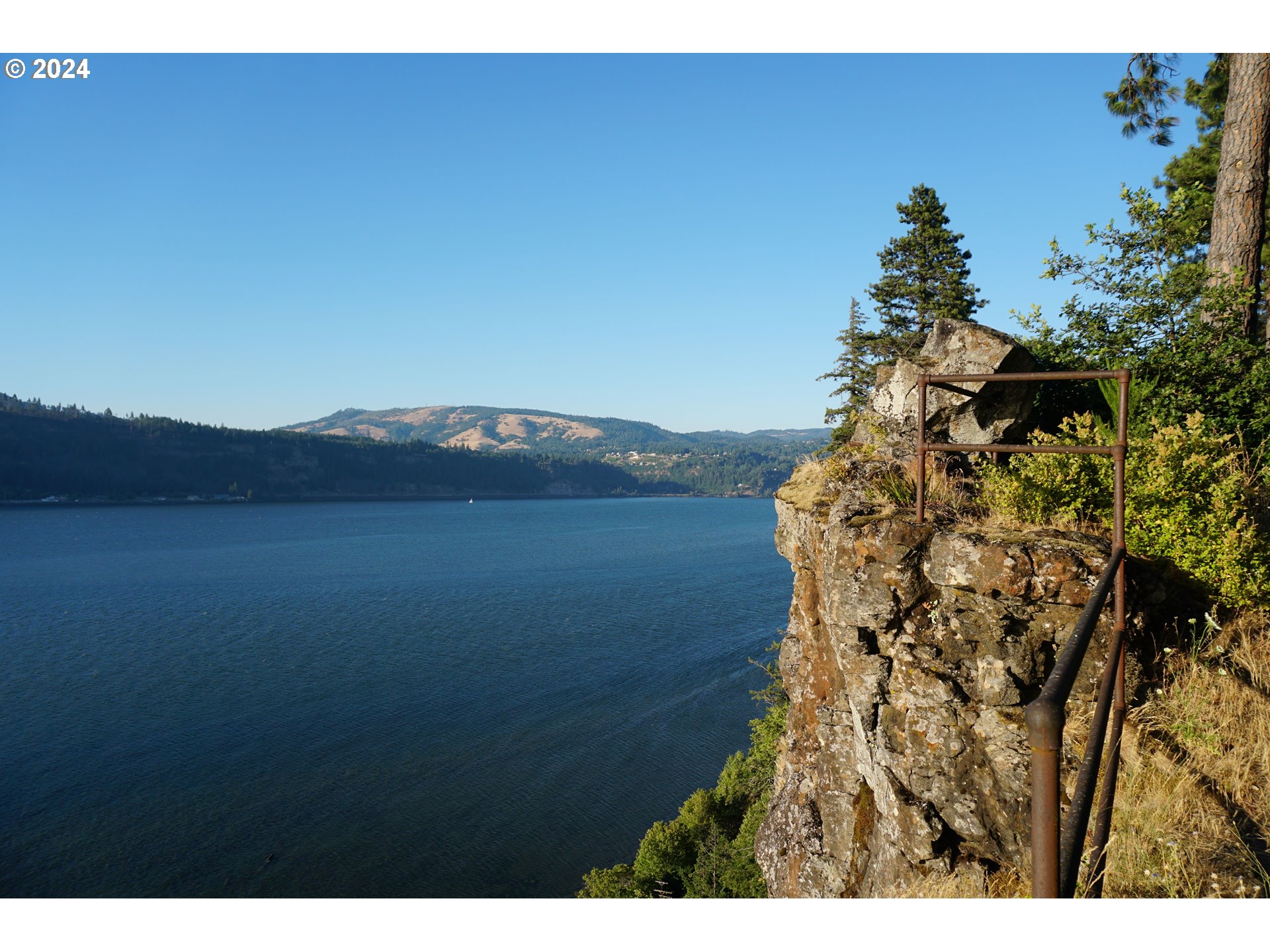 a view of an outdoor space and a lake view