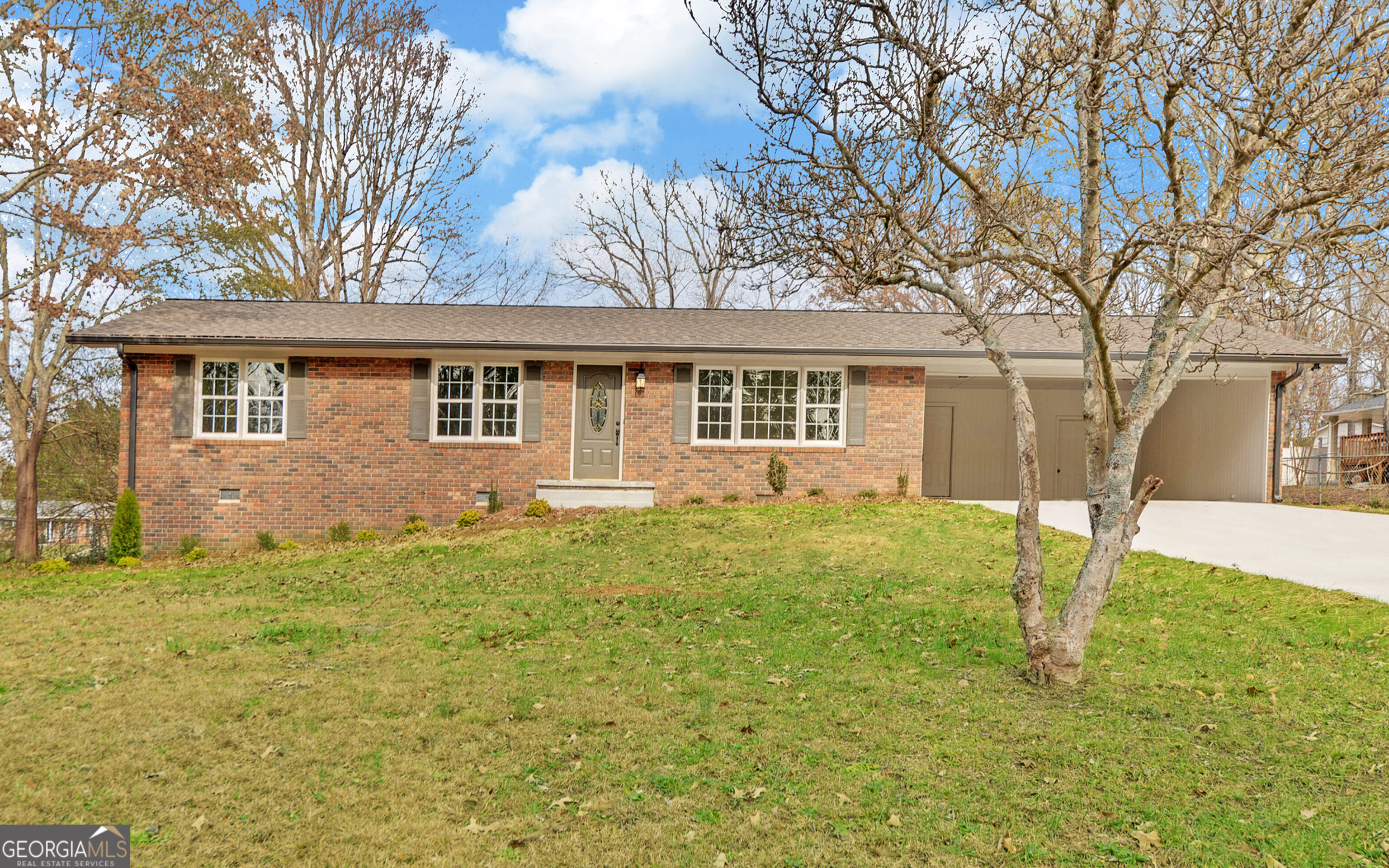 a house view with a garden space