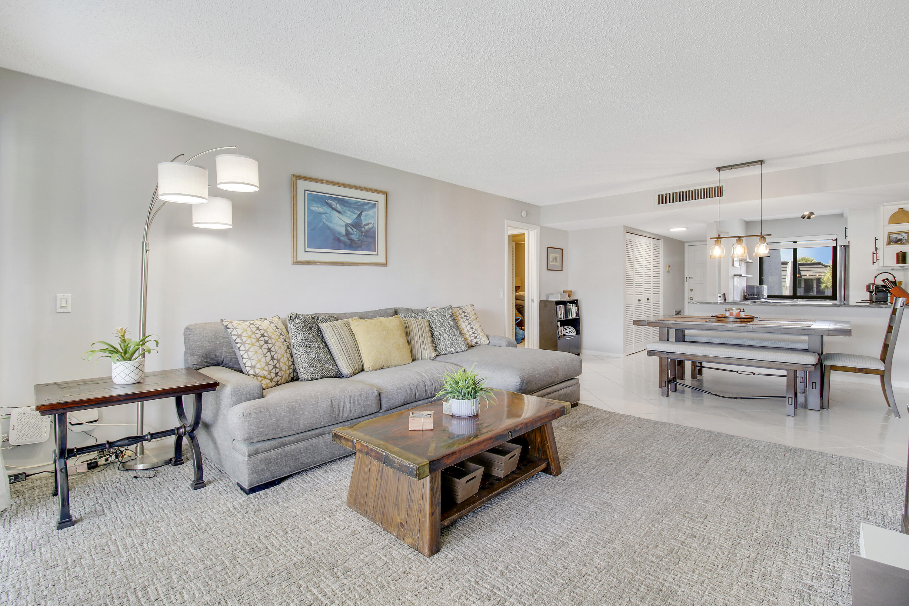 a living room with furniture and a table