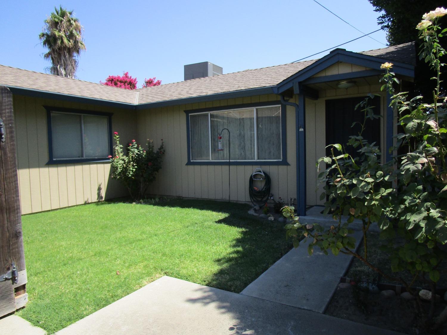 a front view of house with yard