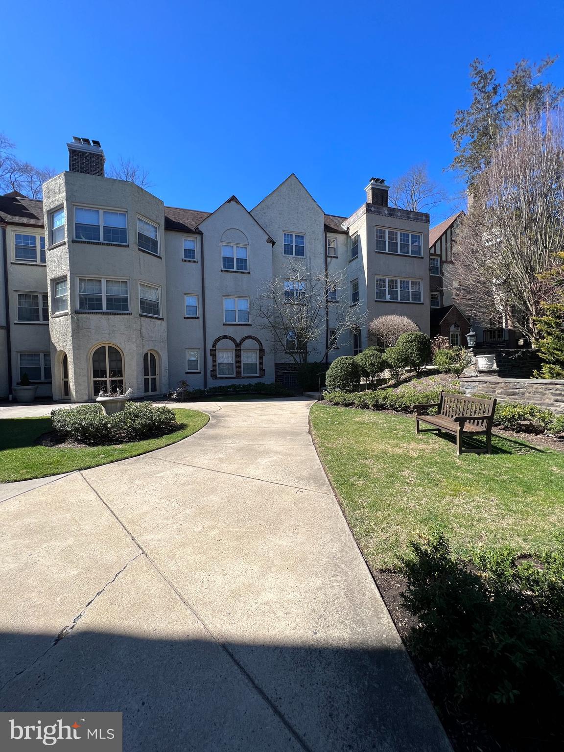 a view of multiple houses with a yard