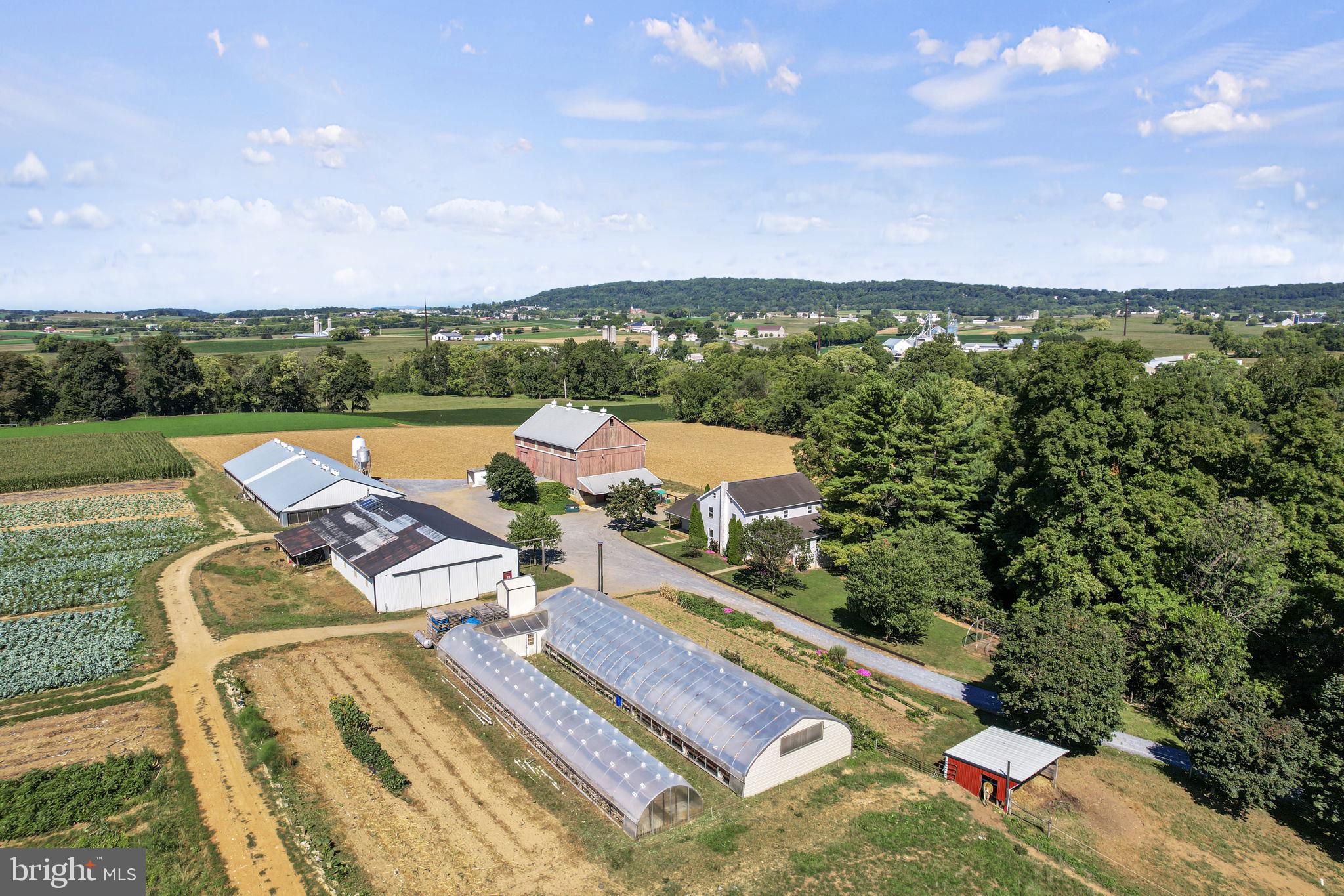 an aerial view of a house with outdoor space