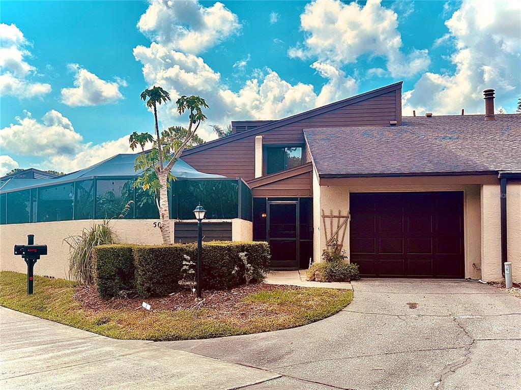 a view of a house with a patio