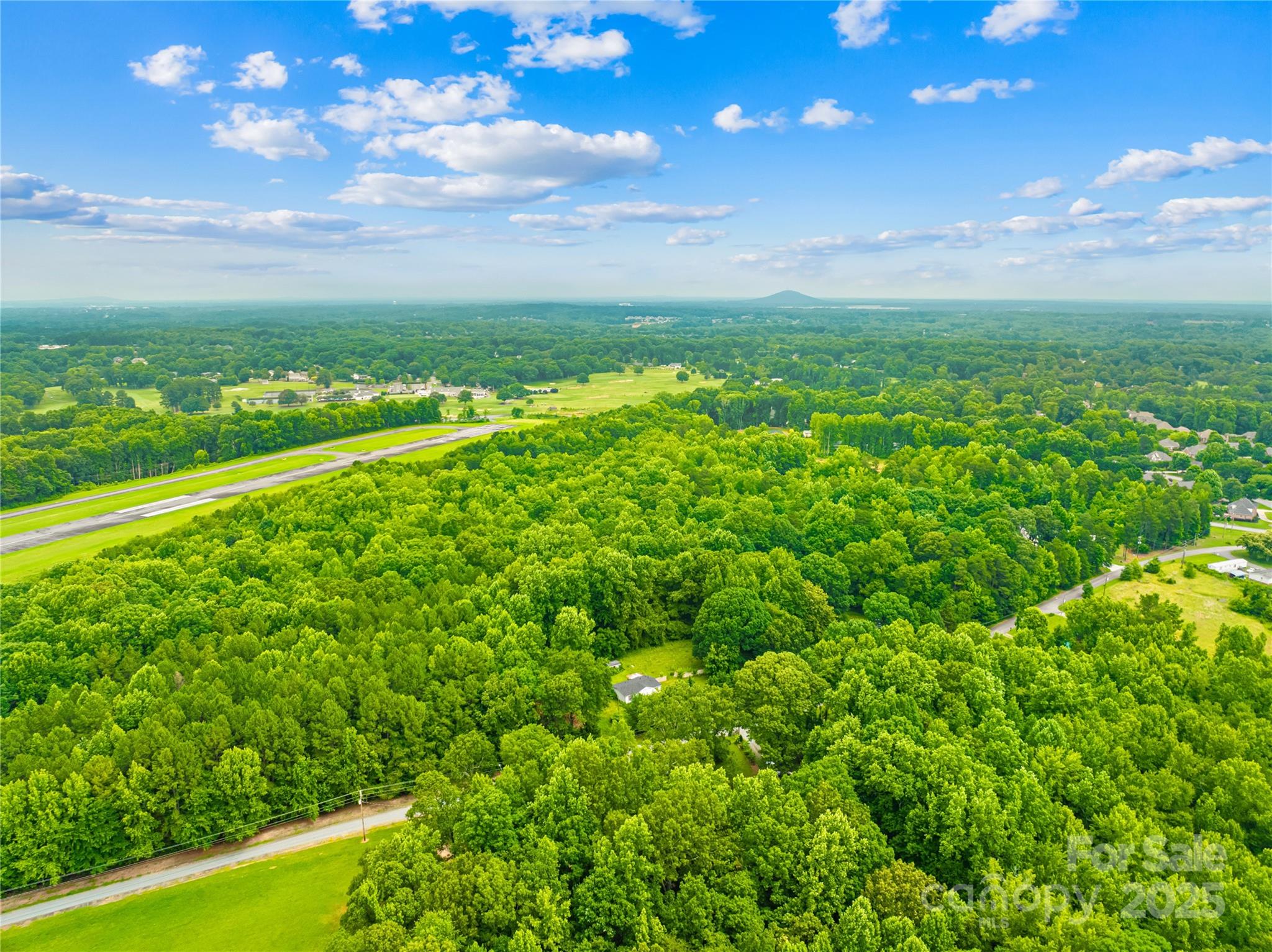 a view of a green field with lots of green space