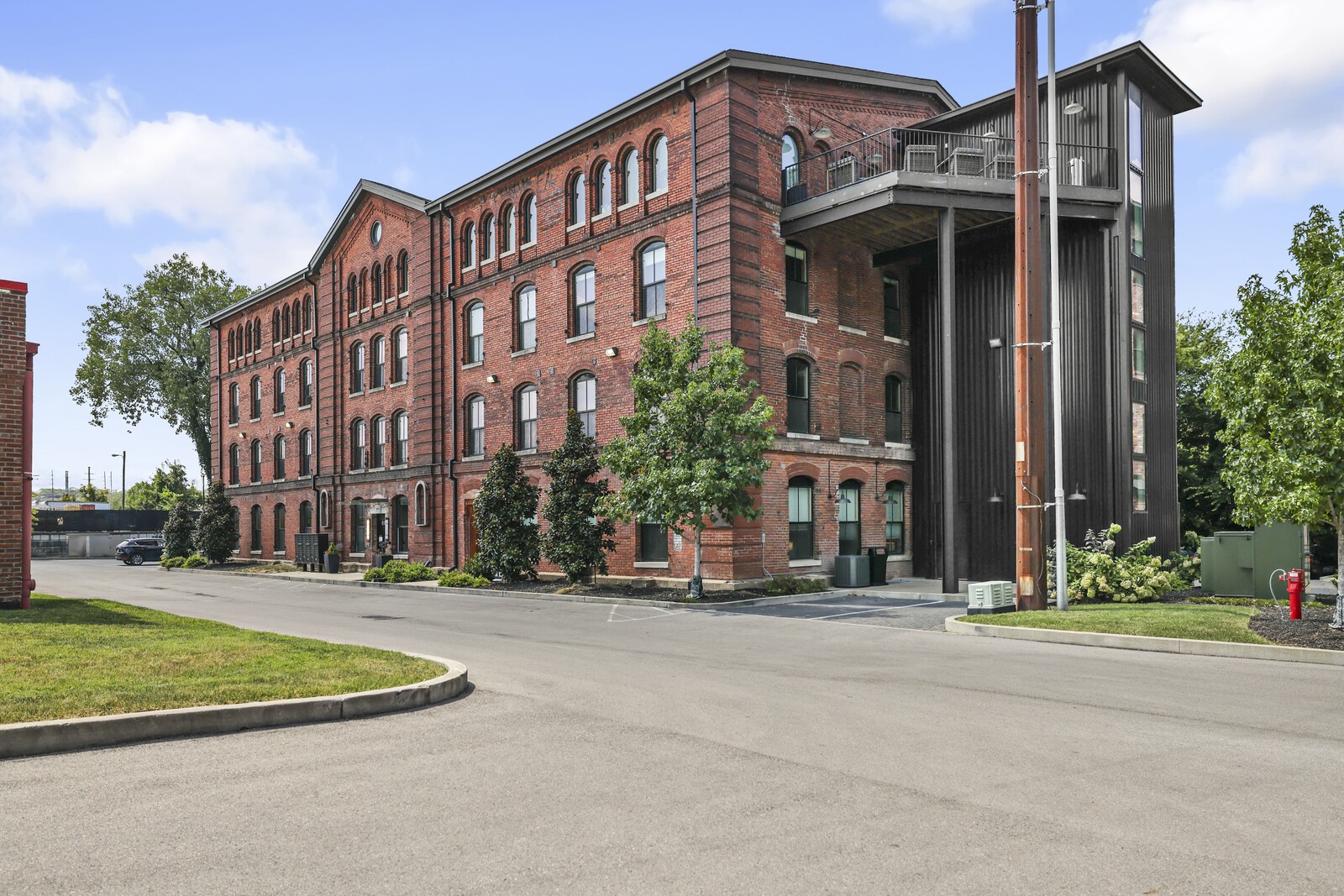 a view of a building with a street