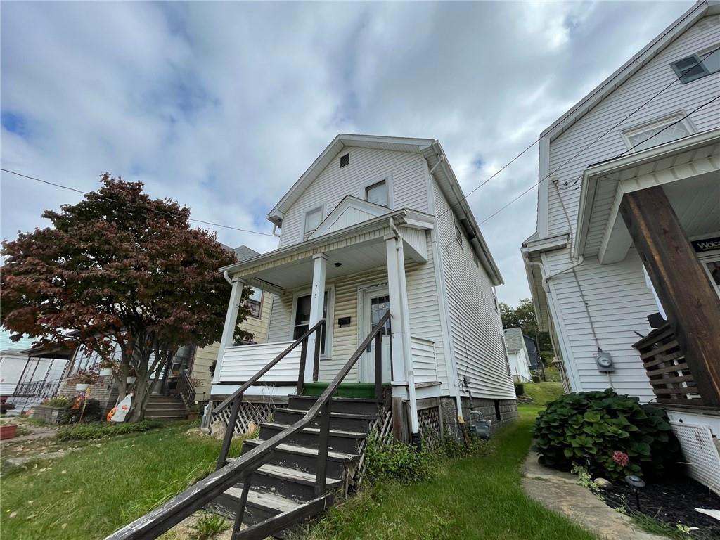 front view of house with a yard