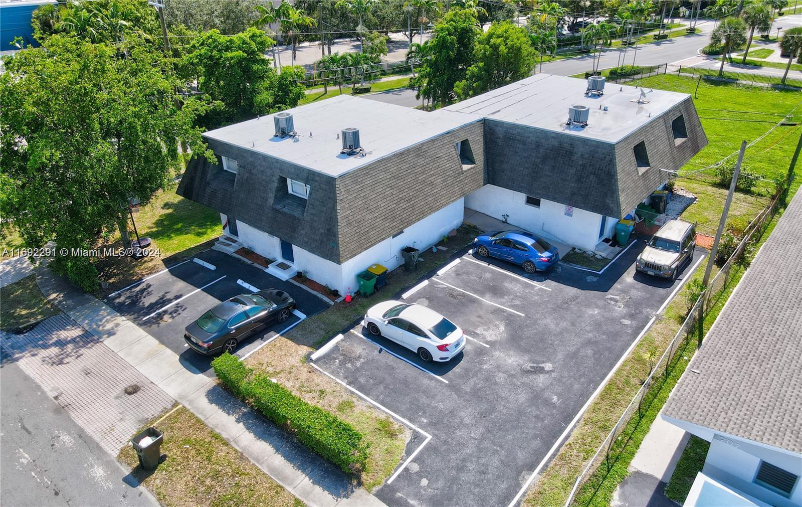 an aerial view of a house with a garden