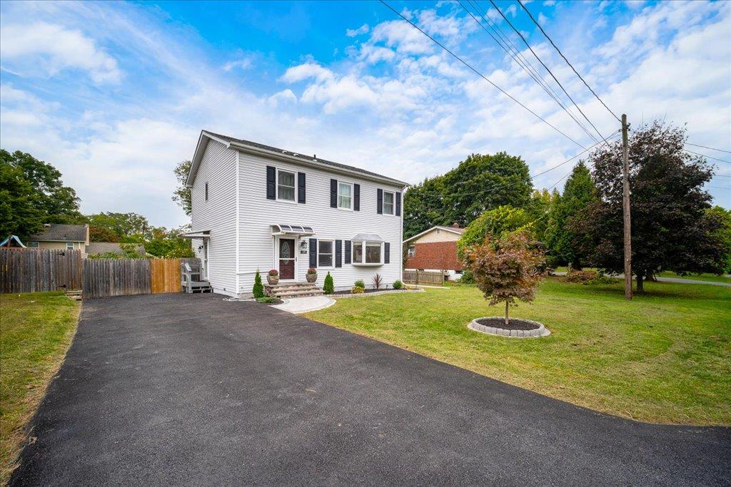 View of front of house with a front lawn