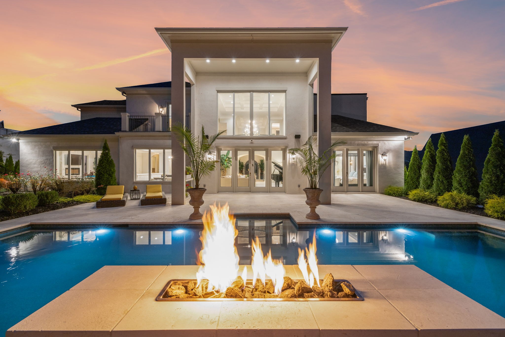 a front view of a house with swimming pool