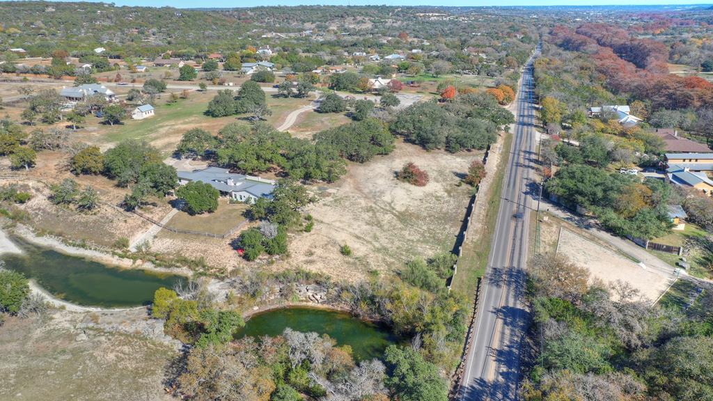 an aerial view of house with yard