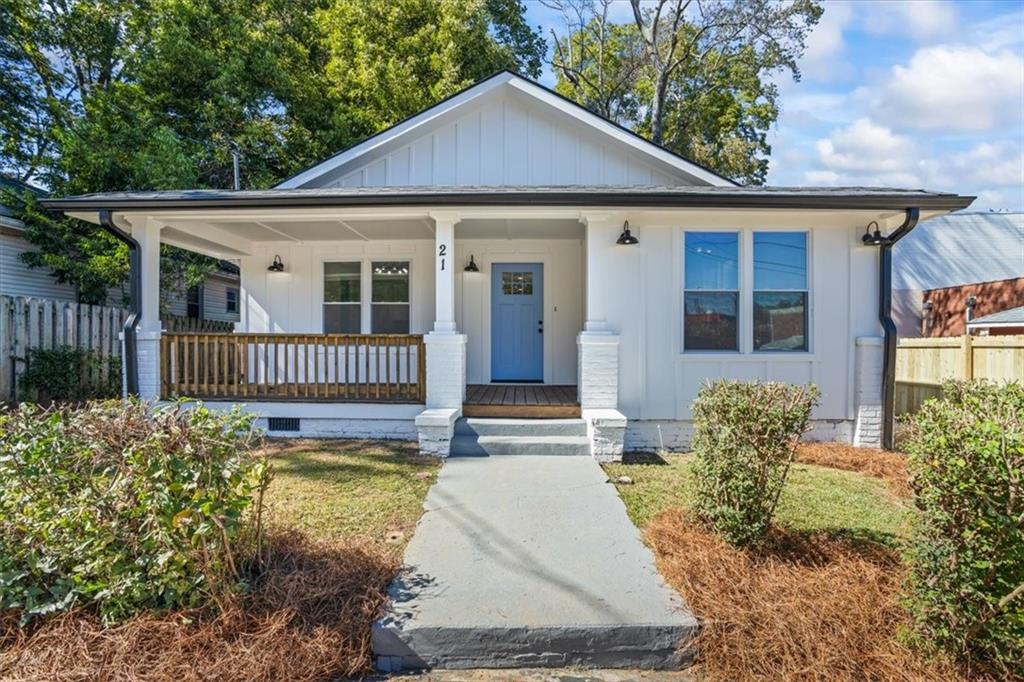 front view of a house with a yard