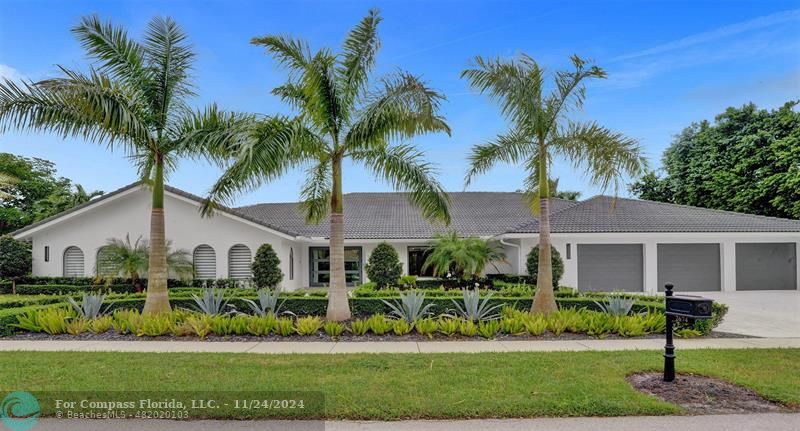 Welcome to 2674 NW 29th Drive!  This Spectacular Corner Lot Estate Features An Oversized 3 Car Garage (The Oversized Interior Garage is 950 sq ft) + Oversized Circular Driveway + All New Professional Landscaping Throughout...