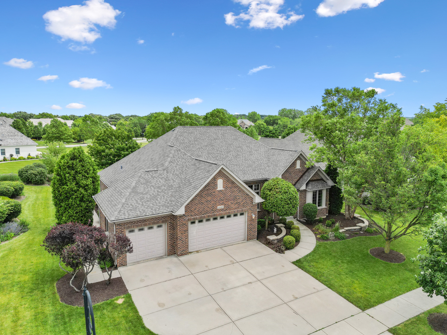 a house view with a garden space