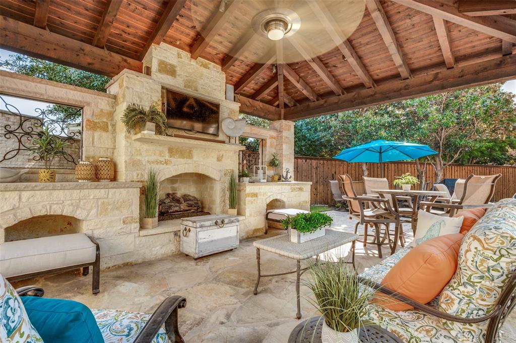 a view of a chairs and table in the patio