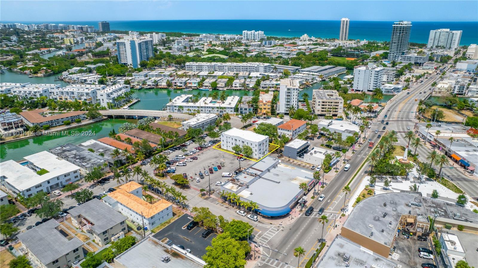 an aerial view of residential building and parking space