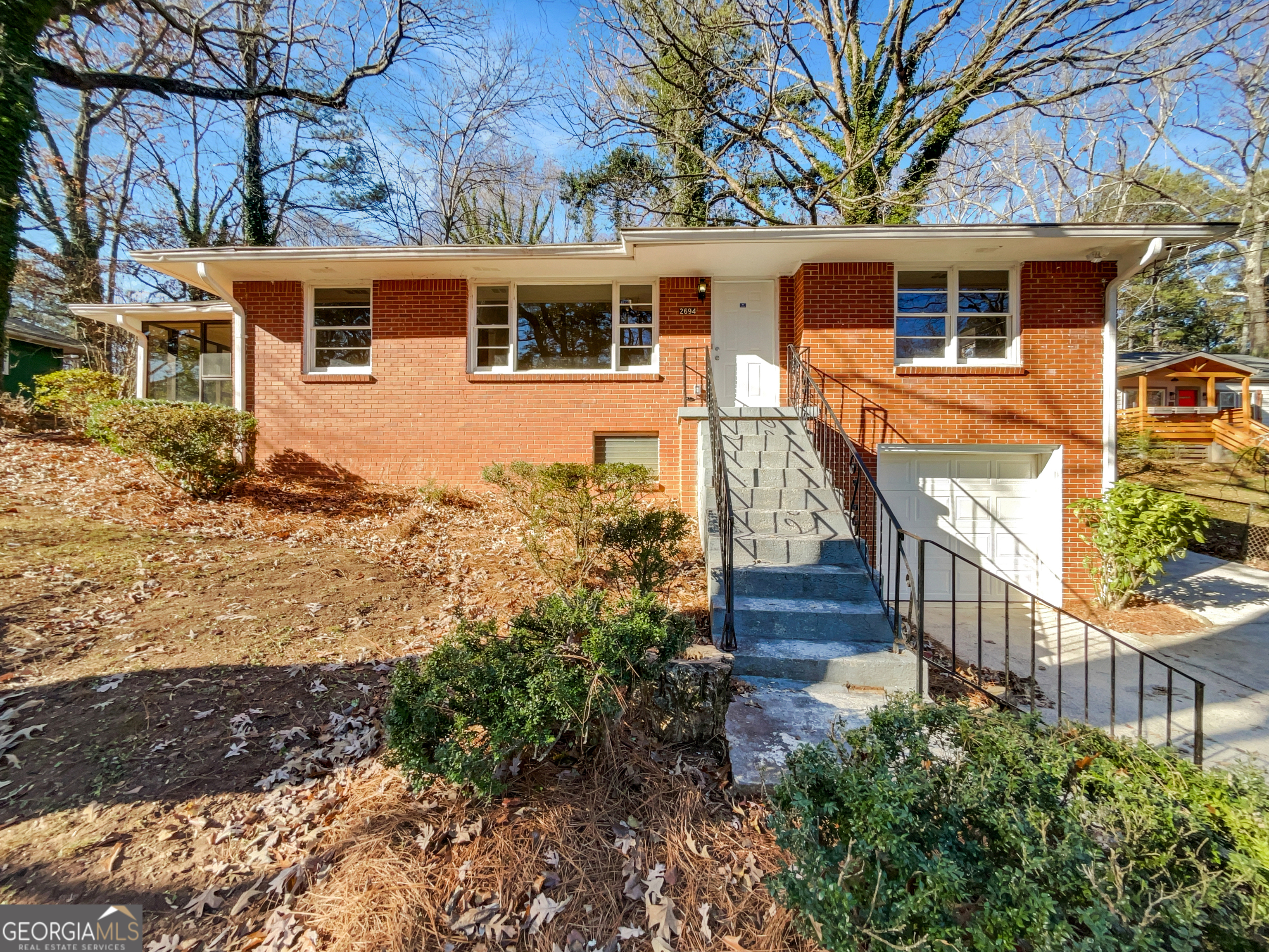 a view of front of house with a yard